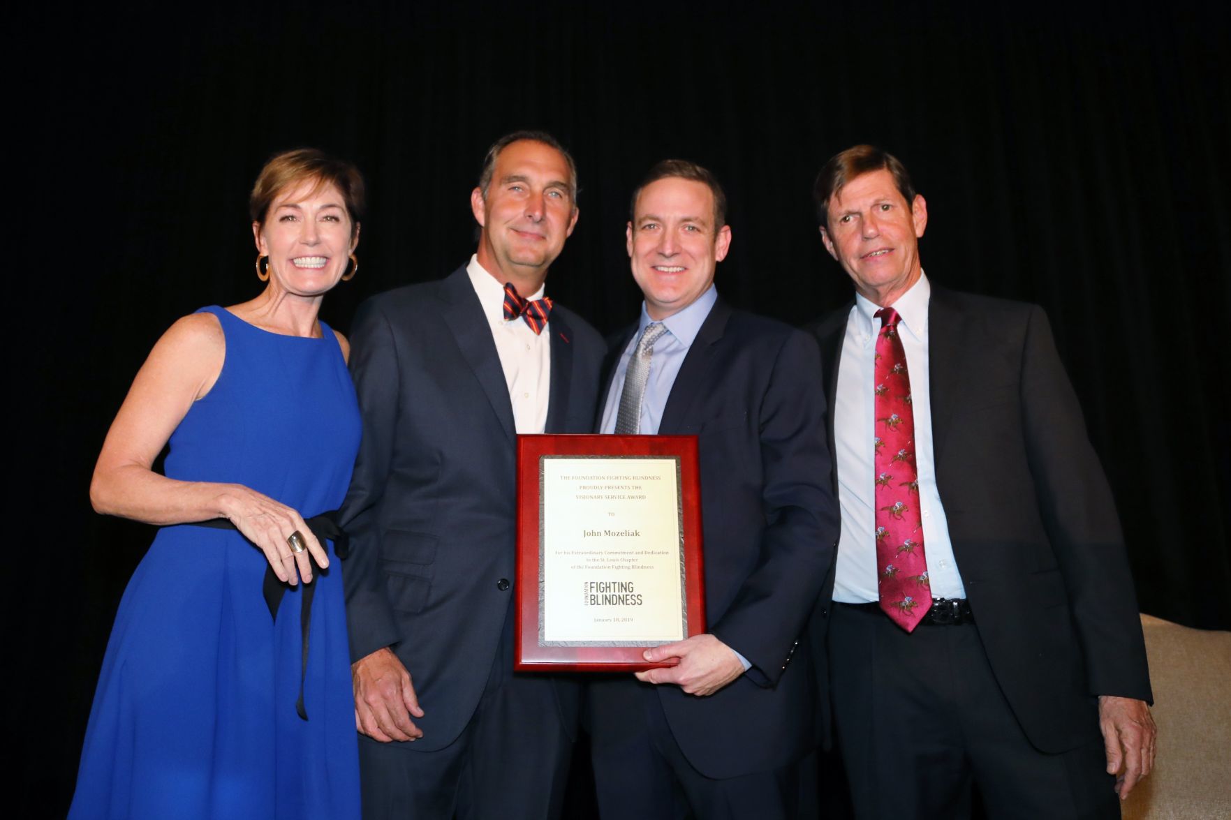 Emly Burch, John Mozeliak, Jason Morris, R. Michael Lowenbaum